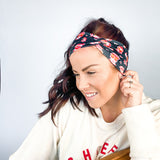 Adult women's black headband with yellow, red and white artistic cartoons of Patrick Mahomes, Avery Reid and Travis Kelce