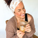 Adult women's light tan headband with allover iced coffee cups and tiny brown, taupe and tan stars