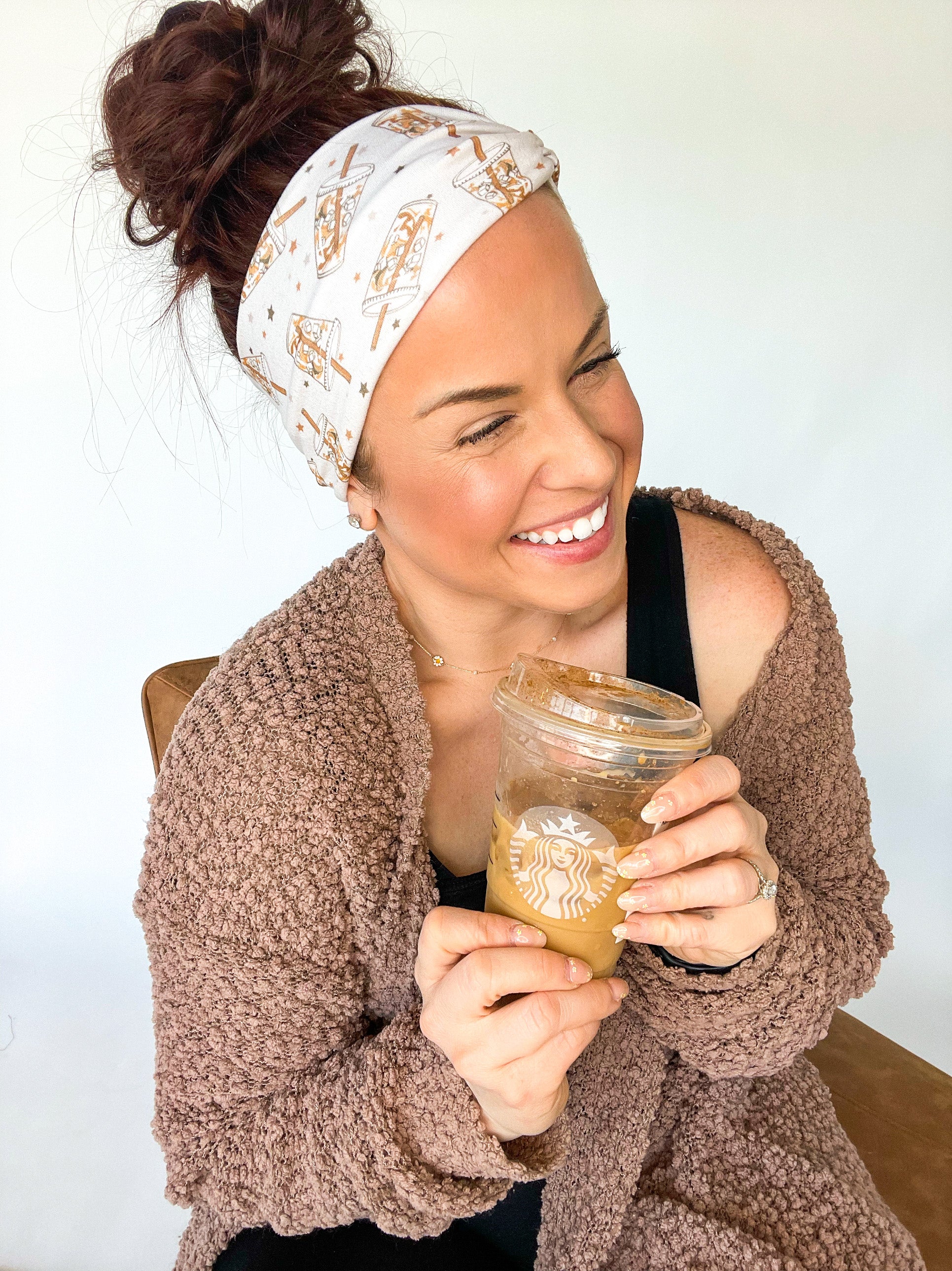 Adult women's light tan headband with allover iced coffee cups and tiny brown, taupe and tan stars