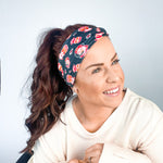 Adult women's black headband with yellow, red and white artistic cartoons of Patrick Mahomes, Avery Reid and Travis Kelce
