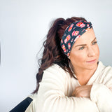 Adult women's black headband with yellow, red and white artistic cartoons of Patrick Mahomes, Avery Reid and Travis Kelce