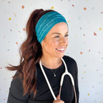 Adult women's teal headband with white EKG line print