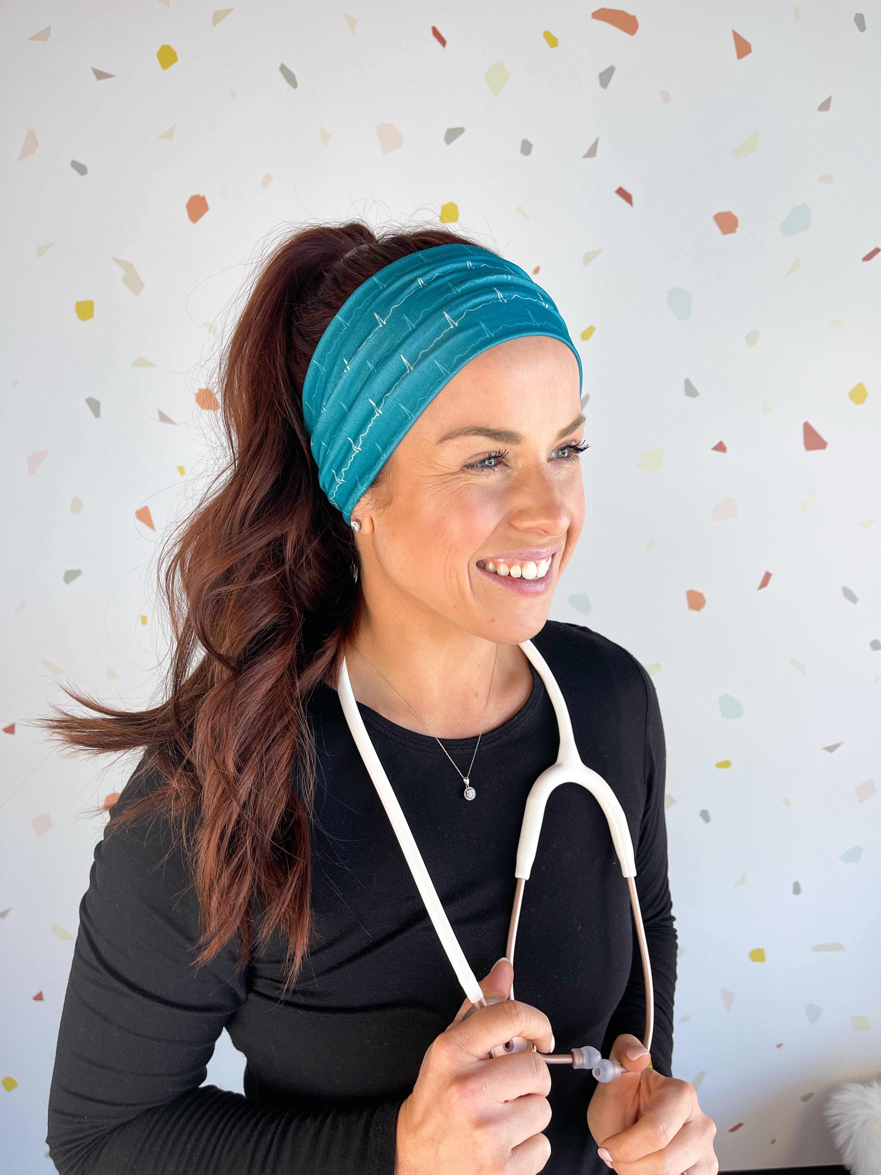 Adult women's teal headband with white EKG line print