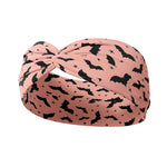 Adult women's apricot headband with medium and small black flying bat allover print