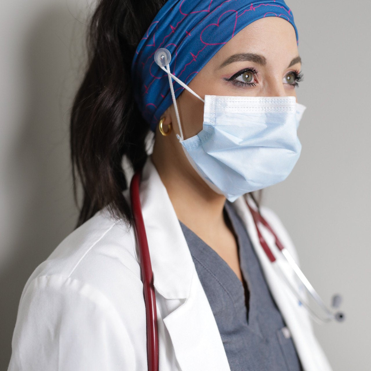 Adult women's deep blue headband with hot pink heart and heart rate print