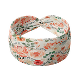 Adult women's ivory headband with watercolor coral, orange, peach and ivory flowers and leaves with the cursive script "I've got you" hidden throughout the print