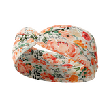 Adult women's ivory headband with watercolor coral, orange, peach and ivory flowers and leaves with the cursive script "I've got you" hidden throughout the print