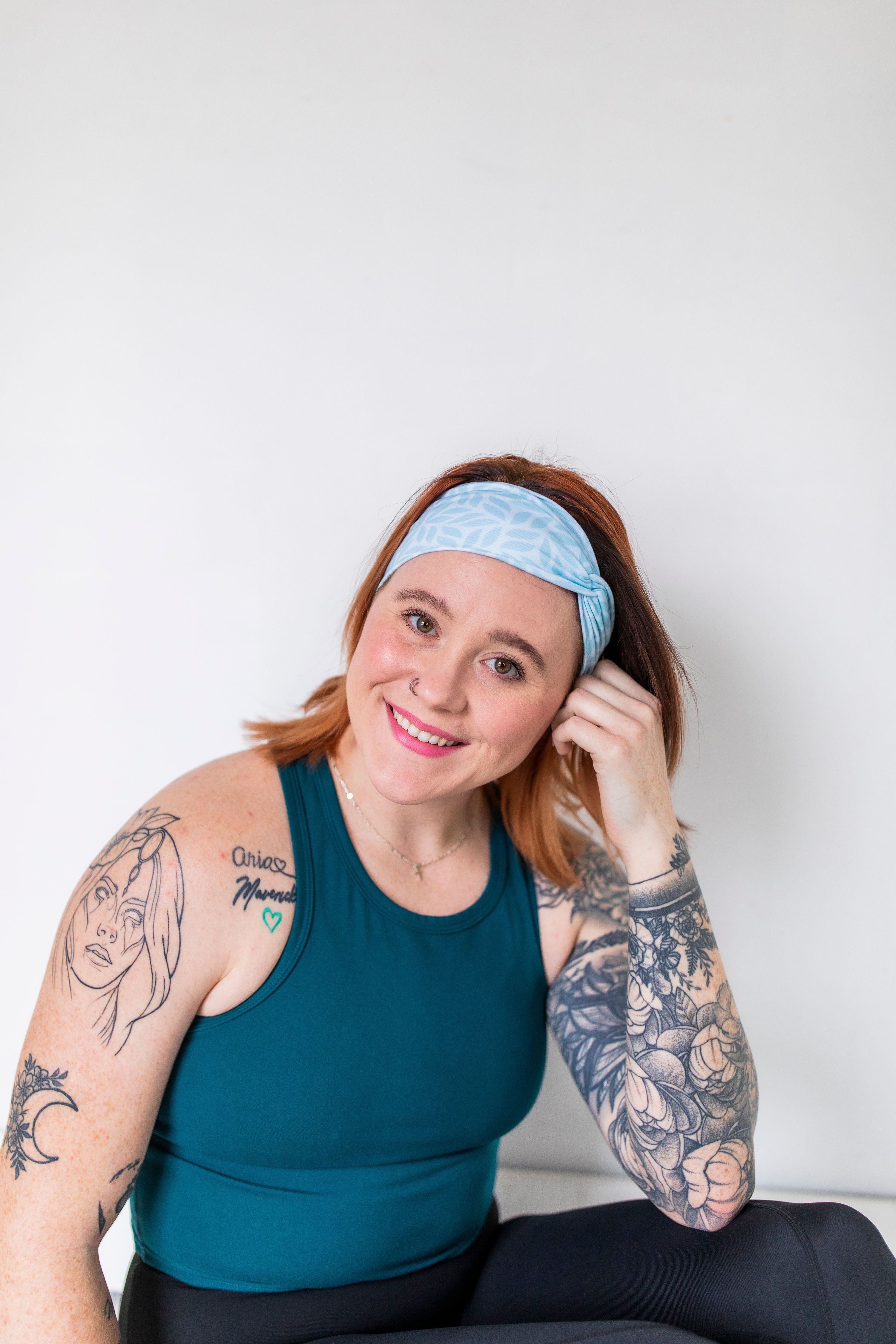 Adult women's light blue headband with blue leaves