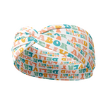 Adult women's white headband with the words "Labor and Delivery" in 70's bubble font with each letter a different color of orange, teal, pink, and green