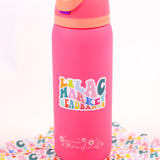 Decorative sticker with 70's style big and small font with the words "Lilac Market" with each letter a different color including orange, pink, teal, green, and blue.