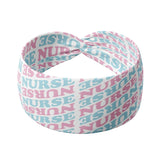 Adult women's white headband with pink and blue allover text saying "nurse"