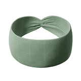Adult women's sage headband with dark sage tribal triangles made of lines going different directions