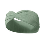 Adult women's sage headband with dark sage tribal triangles made of lines going different directions