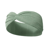 Adult women's sage headband with dark sage tribal triangles made of lines going different directions