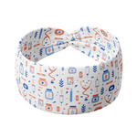 Adult women's white headband with blue and dark orange medium designs of pill bottles, syringes, stethoscopes, emergency bag, and leaves