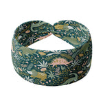 Adult women's green headband with dinosaur and greenery cartoon allover print