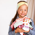 Child girl's 5 pack of headbands with a variety of different colors, patterns, new prints and retired prints in a mystery pack