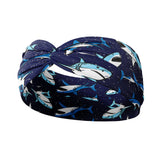 Adult women's navy headband with Great White Sharks swimming and tiny white fleck allover print