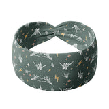 Adult women's emerald green headband with skeleton hands signing love, peace, rock-on and hang-loose shaka sign with yellow lightneing bolts and orange and pink diamonds