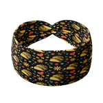 Adult women's black headband with a pair of tacos, red hearts, and small red and yellow flowers and green leaf print
