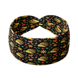 Adult women's black headband with a pair of tacos, red hearts, and small red and yellow flowers and green leaf print