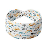 Adult women's white headband with marker drawings of rainbows, yellow sunrises, blue waves, black hearts and black rocks