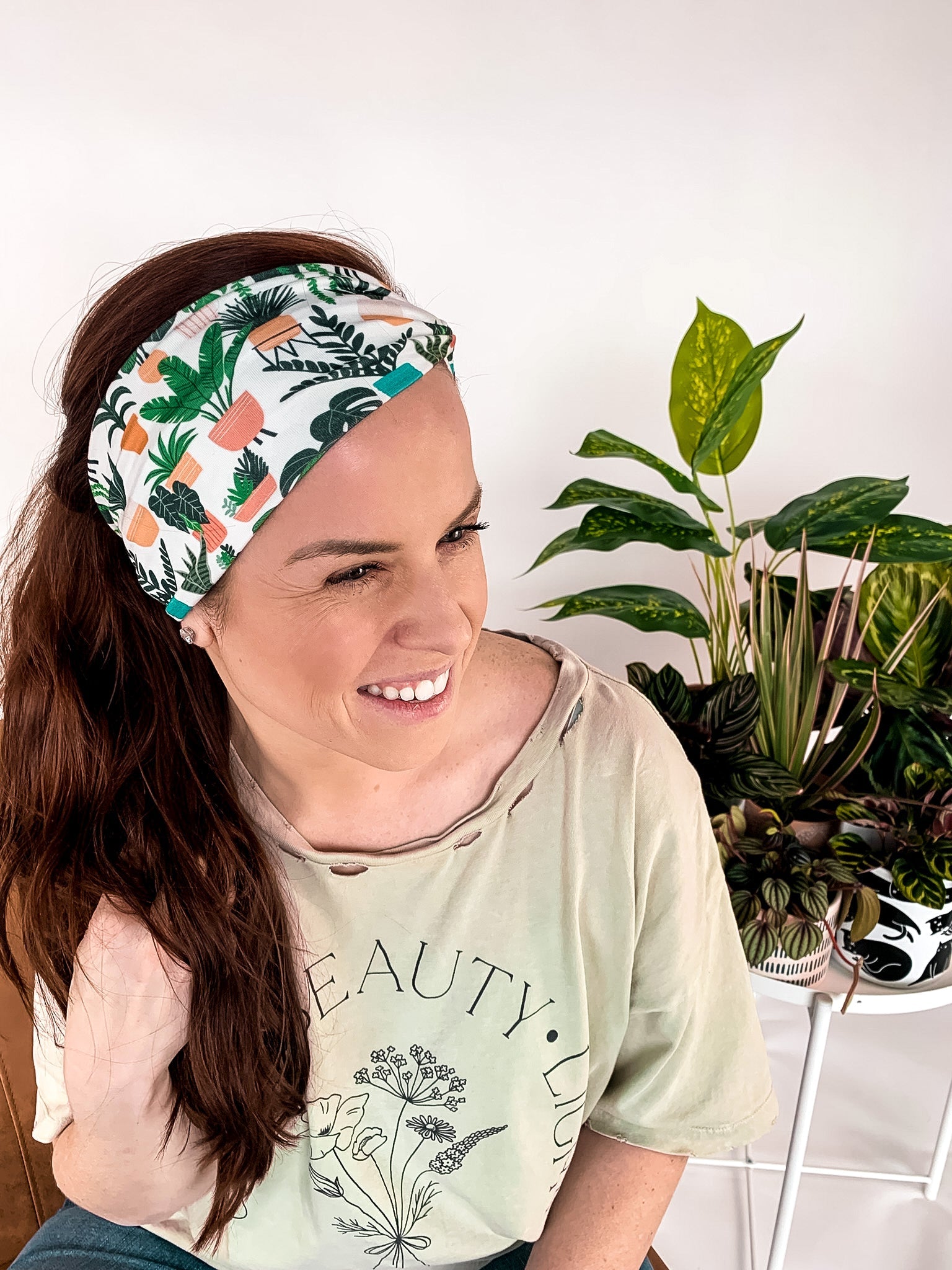 Adult women's white headband with medium potted various houseplants print