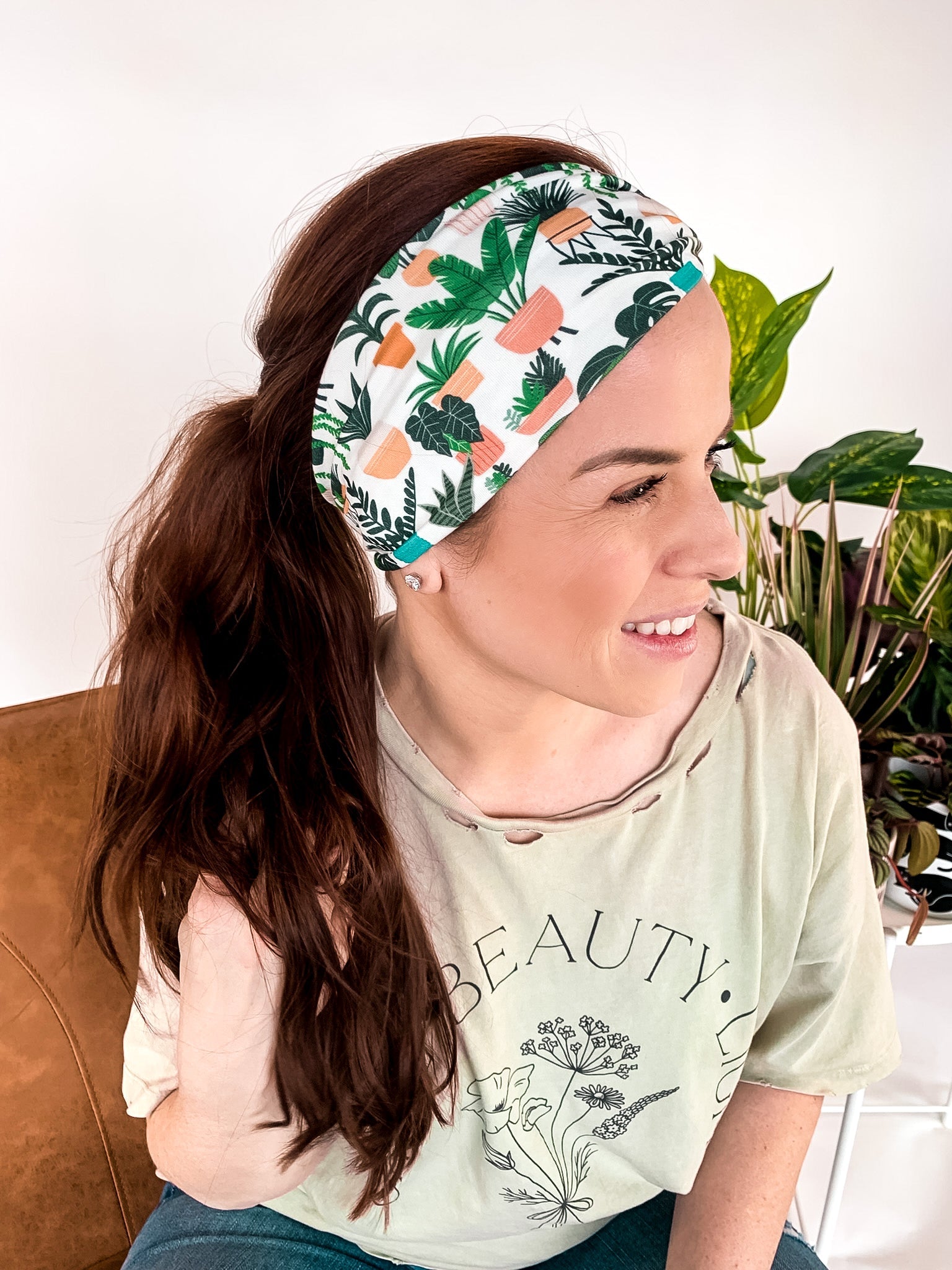 Adult women's white headband with medium potted various houseplants print
