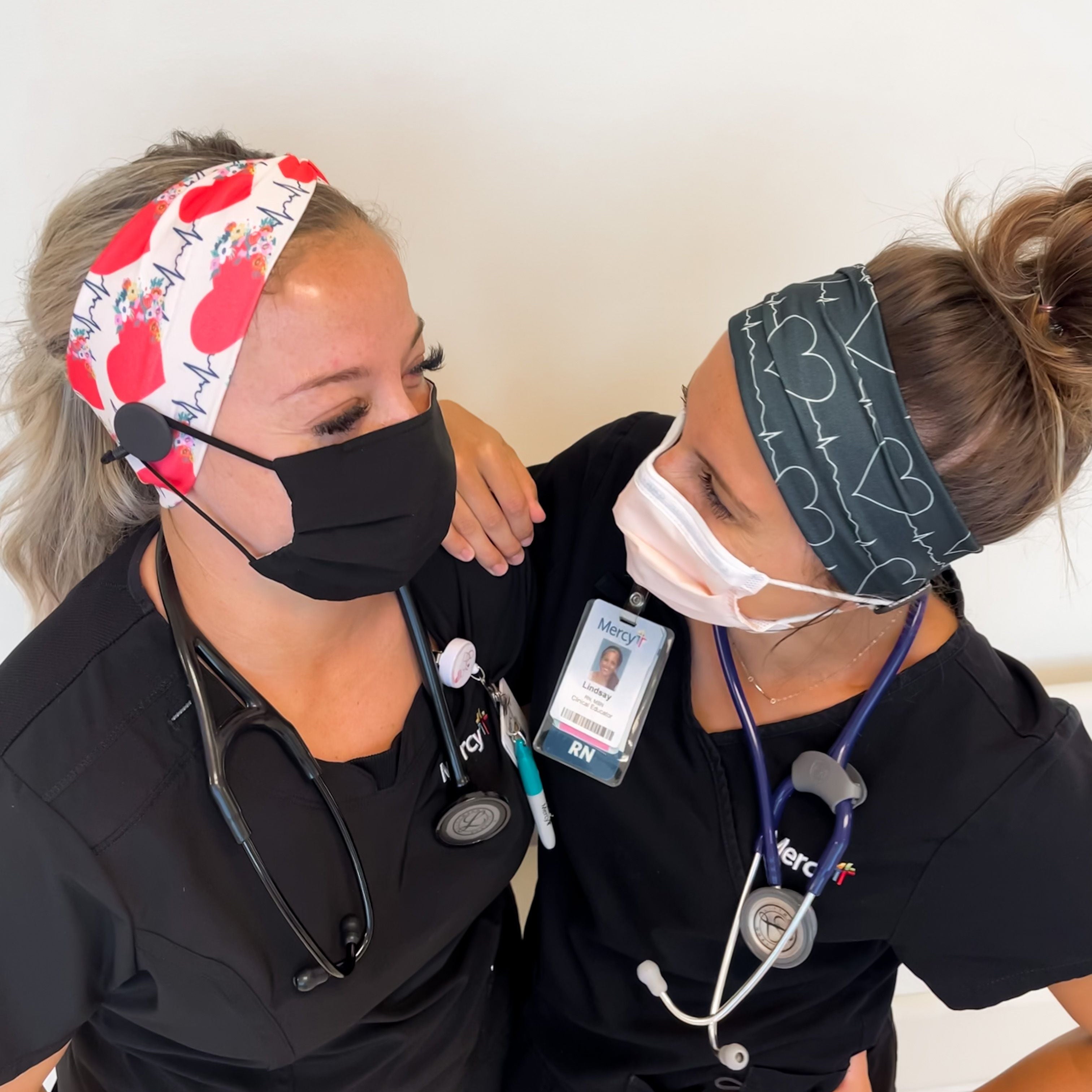 Adult women's black headband with white heart and EKG line print
