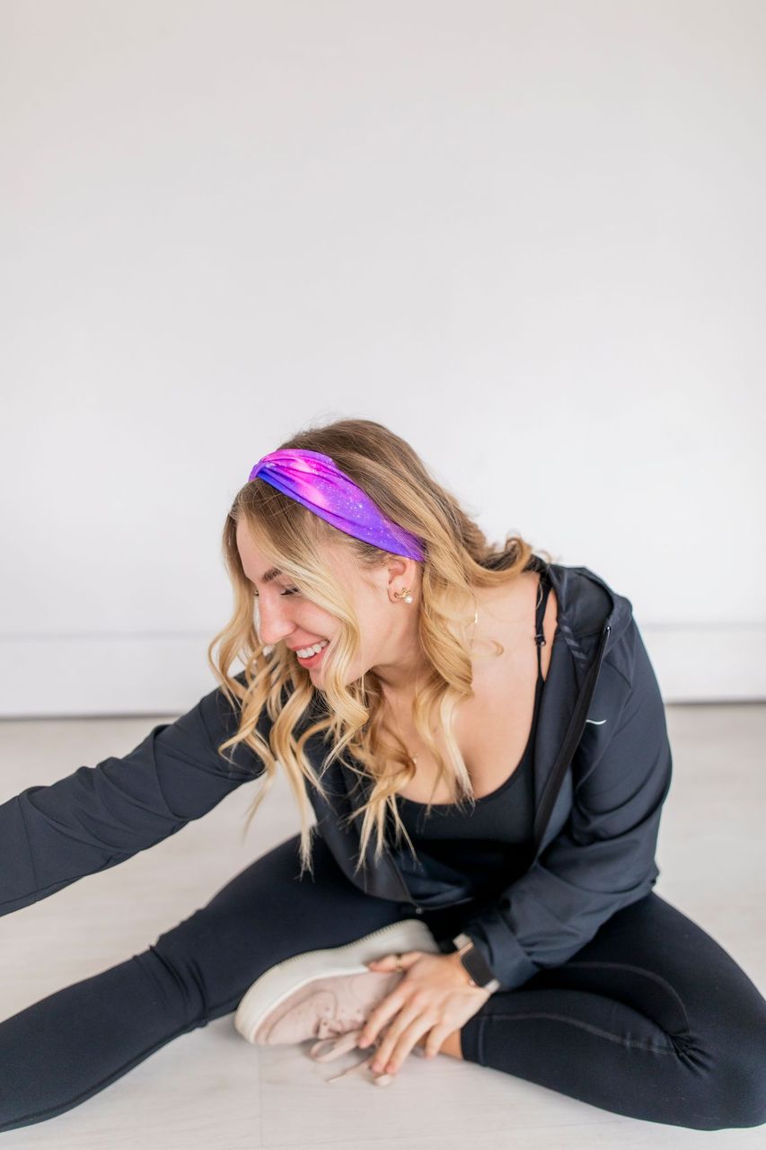 Adult women's deep purple and purple tie dye headband with starry white dots